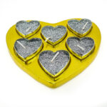 Set x 6 velas corazón en estuche 11 x 13 cm
